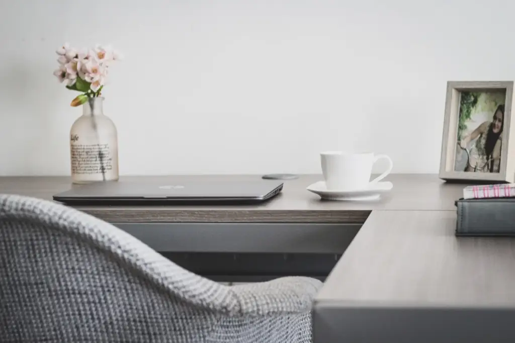 Couple reviewing fixed vs adjustable rate mortgage terms with a lender